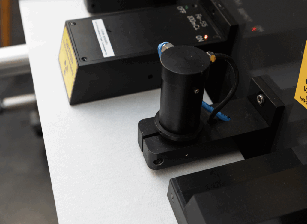 Tapio Transmission Sensor analyzing optical transmission properties of paper.