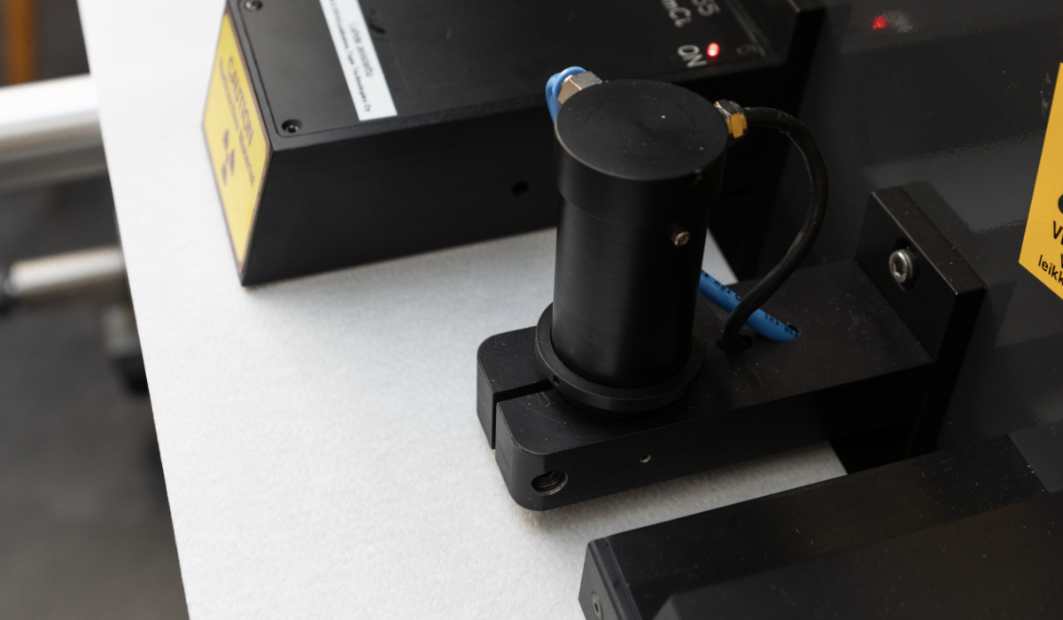 Tapio Transmission Sensor analyzing optical transmission properties of paper.